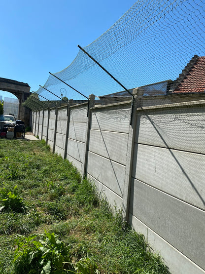 Bavolet anti-fugue sur palissade béton